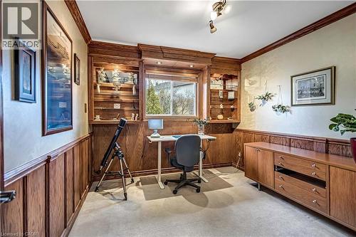 Office featuring crown molding, wooden walls, a wainscoted wall, and light carpet - 640 Acadia Drive, Hamilton, ON - Indoor