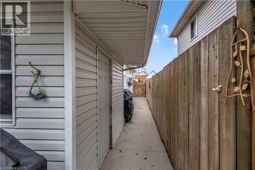 View of home's exterior with a gate - 640 Acadia Drive, Hamilton, ON - Outdoor With Exterior