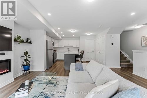 419 Pilot Private, Ottawa, ON - Indoor Photo Showing Living Room With Fireplace