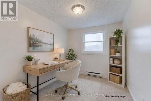 **photo virtually staged - 828 Elgin Street N, Cambridge, ON - Indoor Photo Showing Office