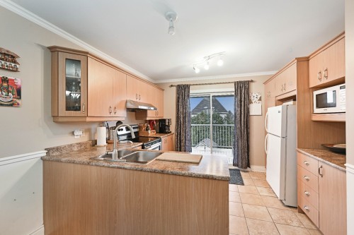 Cuisine - 1405 Av. De Gentilly, Chambly, QC - Indoor Photo Showing Kitchen With Double Sink