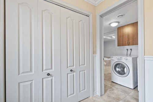 Salle de lavage - 102-50 37E Avenue E., Blainville, QC - Indoor Photo Showing Laundry Room