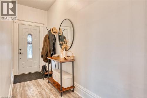 Foyer entrance with light wood-type flooring and baseboards - 37 Cliff Avenue, Hamilton, ON - Indoor Photo Showing Other Room
