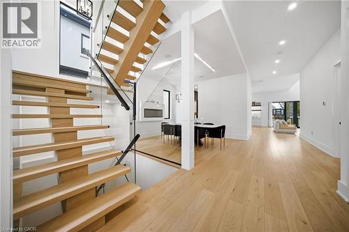 Staircase with wood-type flooring and recessed lighting - 2556 Glengarry Road, Mississauga, ON - Indoor Photo Showing Other Room