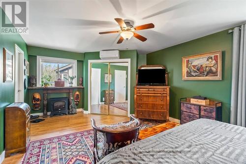 5090 Baldwin Street S, Whitby (Taunton North), ON - Indoor Photo Showing Bedroom With Fireplace
