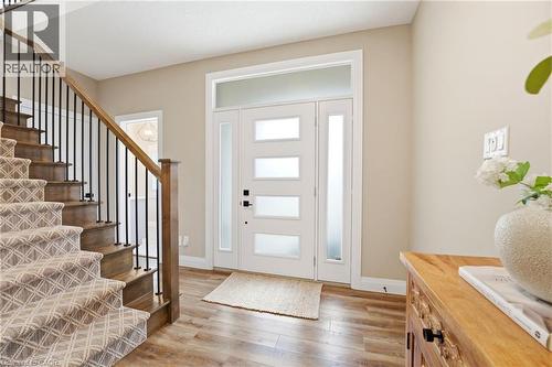 Entryway featuring stairway and light wood-style floors - 39 Mill Race Crescent, St. Jacobs, ON - Indoor Photo Showing Other Room