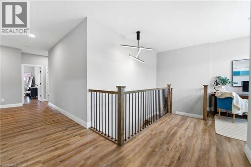 Hallway featuring light wood-type flooring, recessed lighting, and an upstairs landing - 39 Mill Race Crescent, St. Jacobs, ON - Indoor Photo Showing Other Room