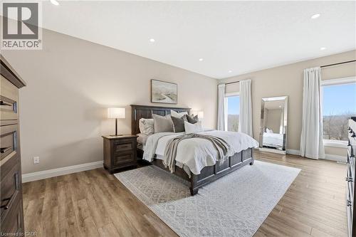 Bedroom with light wood-style flooring and recessed lighting - 39 Mill Race Crescent, St. Jacobs, ON - Indoor Photo Showing Bedroom