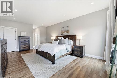 Bedroom with light wood-type flooring and recessed lighting - 39 Mill Race Crescent, St. Jacobs, ON - Indoor Photo Showing Bedroom