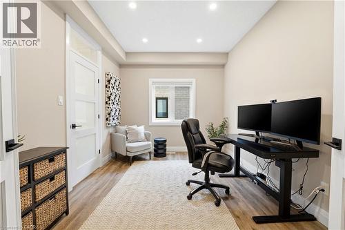 Office with light wood-style flooring and recessed lighting - 39 Mill Race Crescent, St. Jacobs, ON - Indoor Photo Showing Office