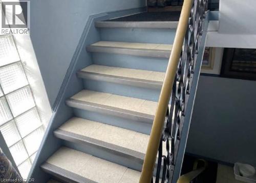 stairs to upper unit - 31 Southdale Avenue, Kitchener, ON - Indoor Photo Showing Other Room