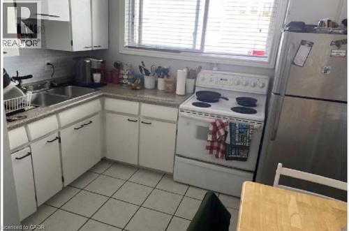 Upper Unit Kitchen - 31 Southdale Avenue, Kitchener, ON - Indoor Photo Showing Kitchen With Double Sink