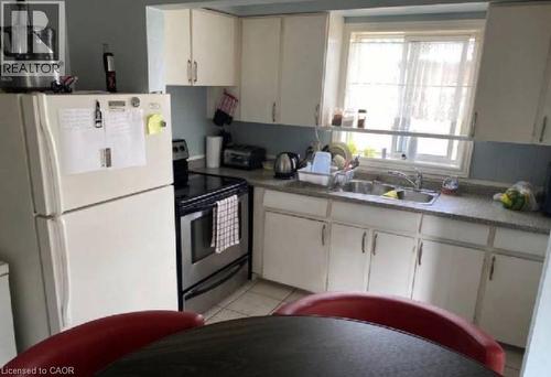 Upper unit kitchen - 31 Southdale Avenue, Kitchener, ON - Indoor Photo Showing Kitchen With Double Sink