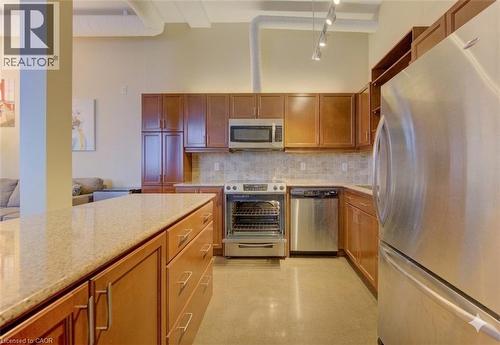Virtually Adjusted - 404 King Street W Unit# 607, Kitchener, ON - Indoor Photo Showing Kitchen With Stainless Steel Kitchen