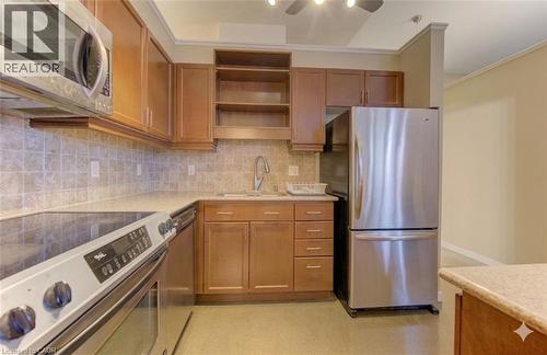Virtually Adjusted - 404 King Street W Unit# 607, Kitchener, ON - Indoor Photo Showing Kitchen With Stainless Steel Kitchen
