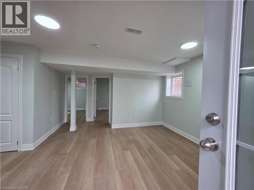 Below grade area with baseboards and light wood-type flooring - 367 Equestrian Way Unit# Basement, Cambridge, ON - Indoor