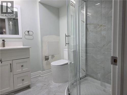 Bathroom with vanity, a marble finish shower, and light marble finish floors - 367 Equestrian Way Unit# Basement, Cambridge, ON - Indoor Photo Showing Bathroom