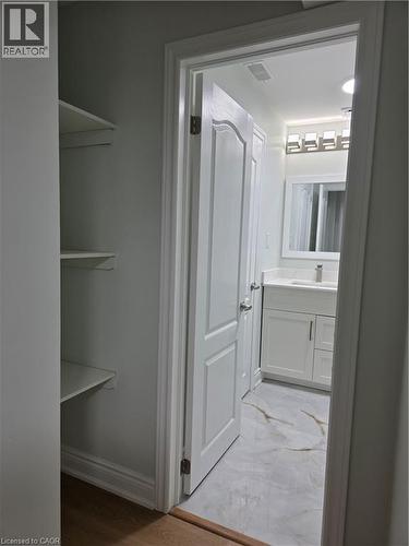 Bathroom featuring vanity and baseboards - 367 Equestrian Way Unit# Basement, Cambridge, ON - Indoor