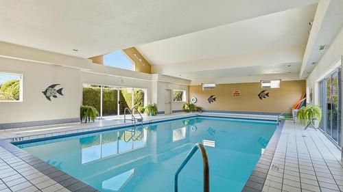 116-650 Lexington Drive, Kelowna, BC - Indoor Photo Showing Other Room With In Ground Pool