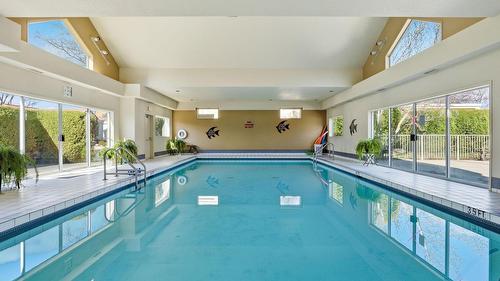 116-650 Lexington Drive, Kelowna, BC - Indoor Photo Showing Other Room With In Ground Pool