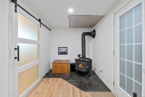 Salon - 46 Rue Migué, Saint-Jacques, QC - Indoor Photo Showing Other Room With Fireplace