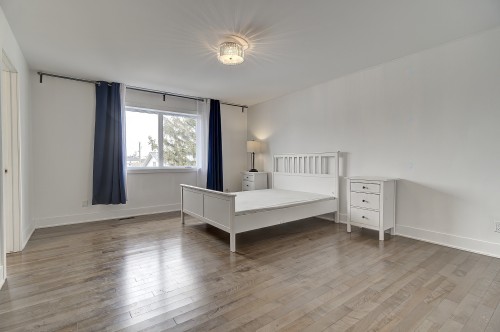 Chambre à coucher principale - 5673 Rue Alexandre, Brossard, QC - Indoor Photo Showing Bedroom