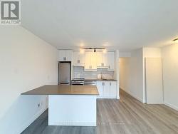 UNIT 11 - 678 QUEEN STREET E Toronto, ON M4M 1G8