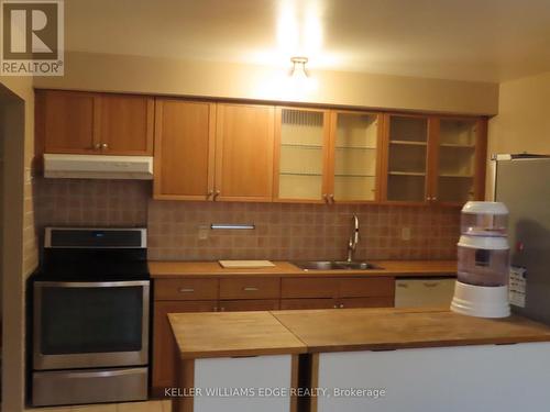 12 - 4026 Longmoor Drive, Burlington, ON - Indoor Photo Showing Kitchen With Double Sink