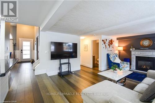 39 Endeavour Drive, Cambridge, ON - Indoor Photo Showing Living Room With Fireplace