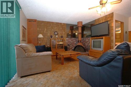 608 Nicoll Lane, Regina Beach, SK - Indoor Photo Showing Living Room With Fireplace