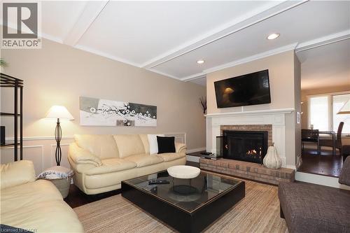 24 Primrose Path, Kitchener, ON - Indoor Photo Showing Living Room With Fireplace