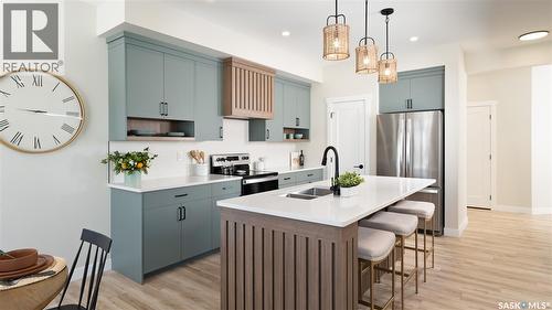 2986 Dumont Way, Regina, SK - Indoor Photo Showing Kitchen With Double Sink With Upgraded Kitchen