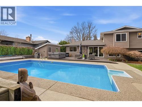 4337 Dunvegan Court, Kelowna, BC - Outdoor With In Ground Pool With Backyard