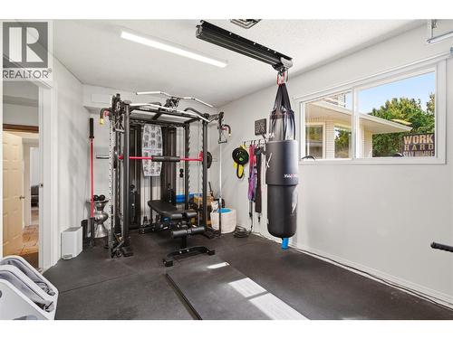 Garage - 4337 Dunvegan Court, Kelowna, BC - Indoor Photo Showing Gym Room