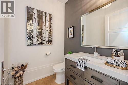 Bathroom with vanity and light wood finished floors - 19 Guelph Avenue Unit# 308, Cambridge, ON - Indoor Photo Showing Other Room