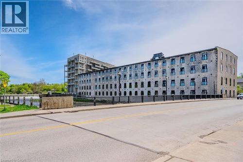 View of apartment building / complex - 19 Guelph Avenue Unit# 308, Cambridge, ON - Outdoor With Facade