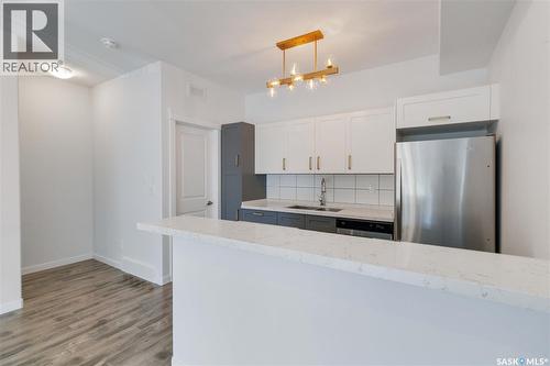 453 L Avenue S, Saskatoon, SK - Indoor Photo Showing Kitchen With Stainless Steel Kitchen With Double Sink