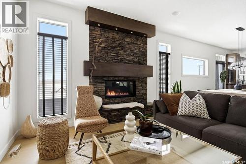 2722 Alfred Crescent, Regina, SK - Indoor Photo Showing Living Room With Fireplace