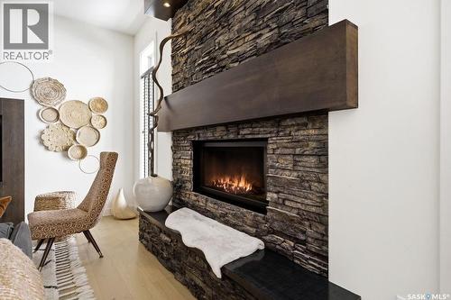 2722 Alfred Crescent, Regina, SK - Indoor Photo Showing Living Room With Fireplace