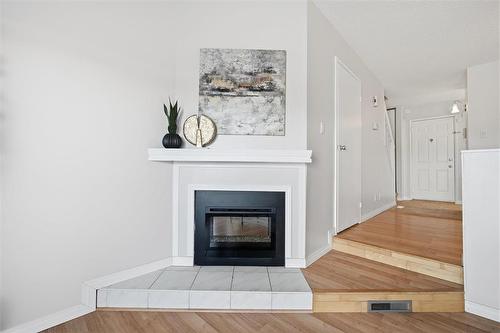 B 67 Apple Lane, Winnipeg, MB - Indoor Photo Showing Living Room With Fireplace
