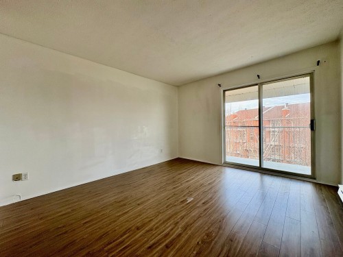 Living Room - 402-55 Rue Beauséjour, La Prairie, QC - Indoor Photo Showing Other Room