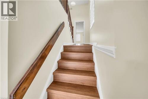 Stairway with wood finished floors - 51 Seabrook Drive, Kitchener, ON - Indoor Photo Showing Other Room