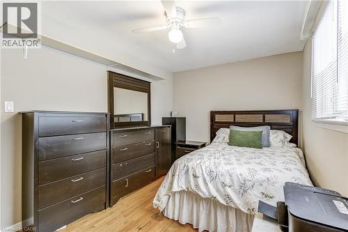 Bedroom featuring light wood-style floors and a ceiling fan - 2145 Sandringham Drive, Burlington, ON - Indoor Photo Showing Bedroom