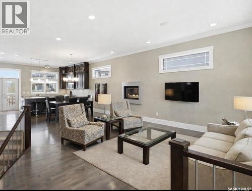 511 Bennion Terrace, Saskatoon, SK - Indoor Photo Showing Living Room With Fireplace