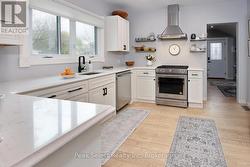 Main House Stylish White Quartz kitchen - 