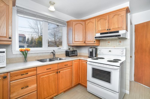 Cuisine - 966 Av. Du Parc, Laval (Saint-Vincent-De-Paul), QC - Indoor Photo Showing Kitchen With Double Sink