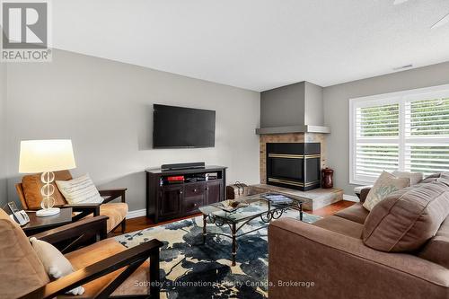 318 Mariners Way, Collingwood, ON - Indoor Photo Showing Living Room With Fireplace