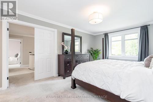 8 Malta Crescent, Springwater, ON - Indoor Photo Showing Bedroom