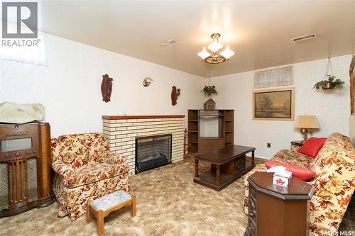 24 Anderson Crescent, Saskatoon, SK - Indoor Photo Showing Living Room With Fireplace