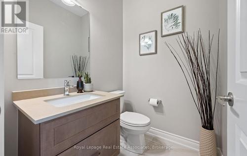 Powder room on main floor - 1285 Raspberry Terrace, Milton, ON - Indoor Photo Showing Bathroom